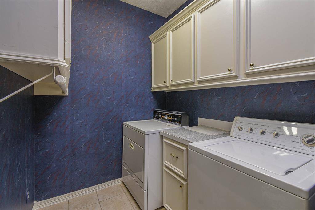Inside Utility Room with Built in Cabinetry