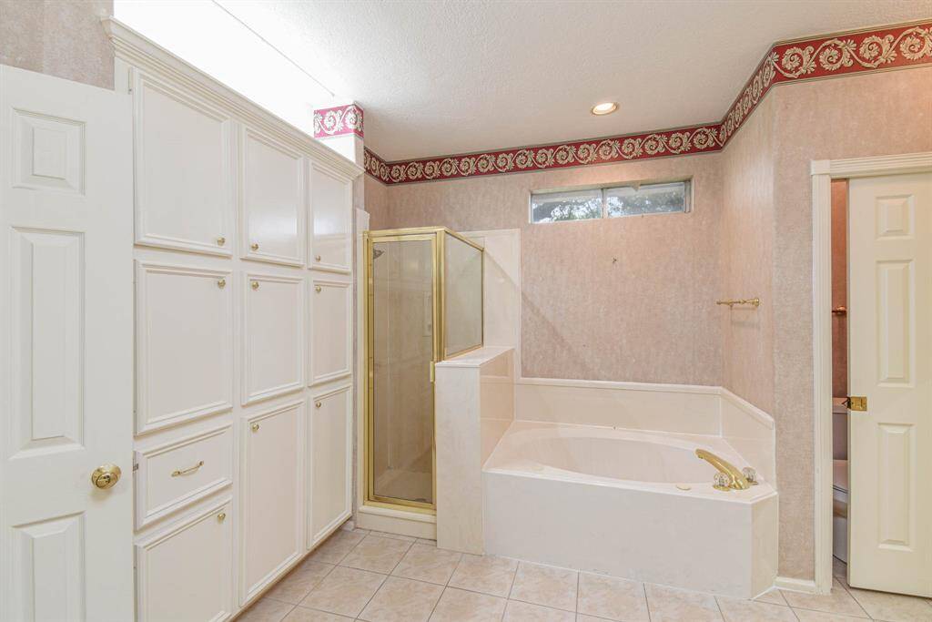 Primary Bathroom with Jetted Tub & Separate Shower