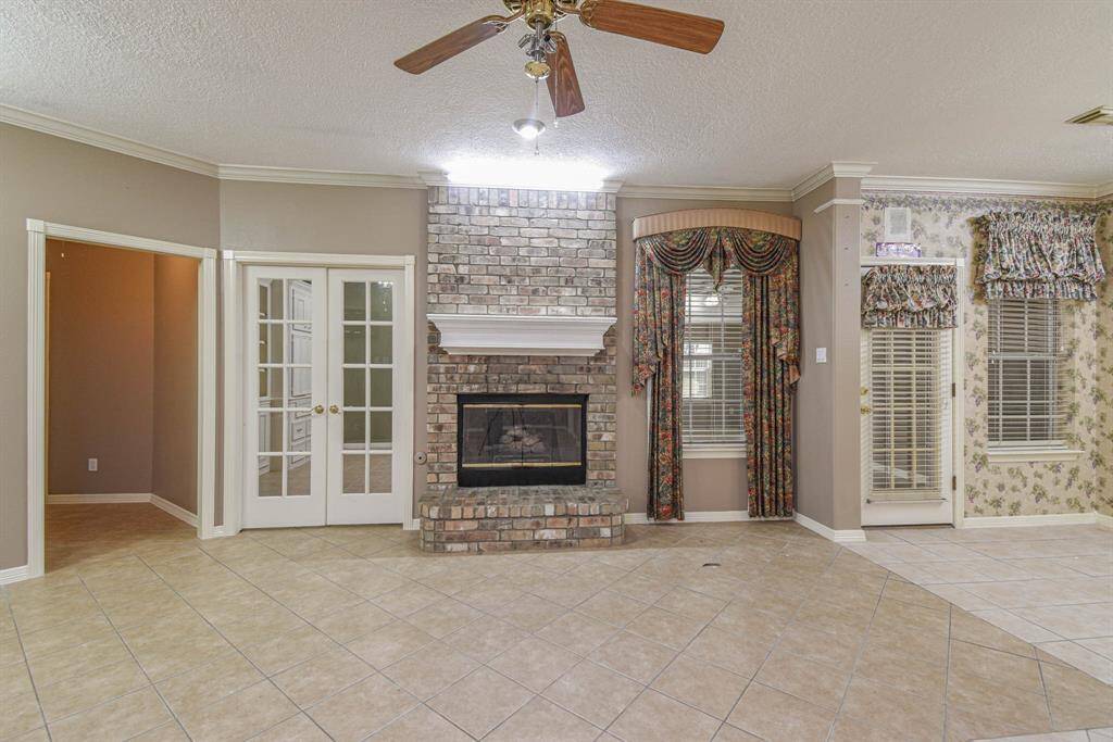 Open Family Living Area with Gaslog Fireplace