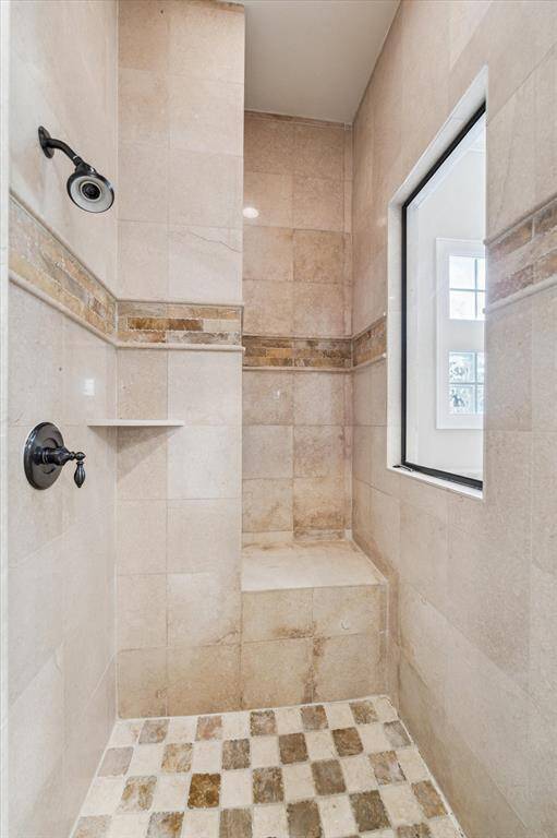 Separate shower with glass enclosure