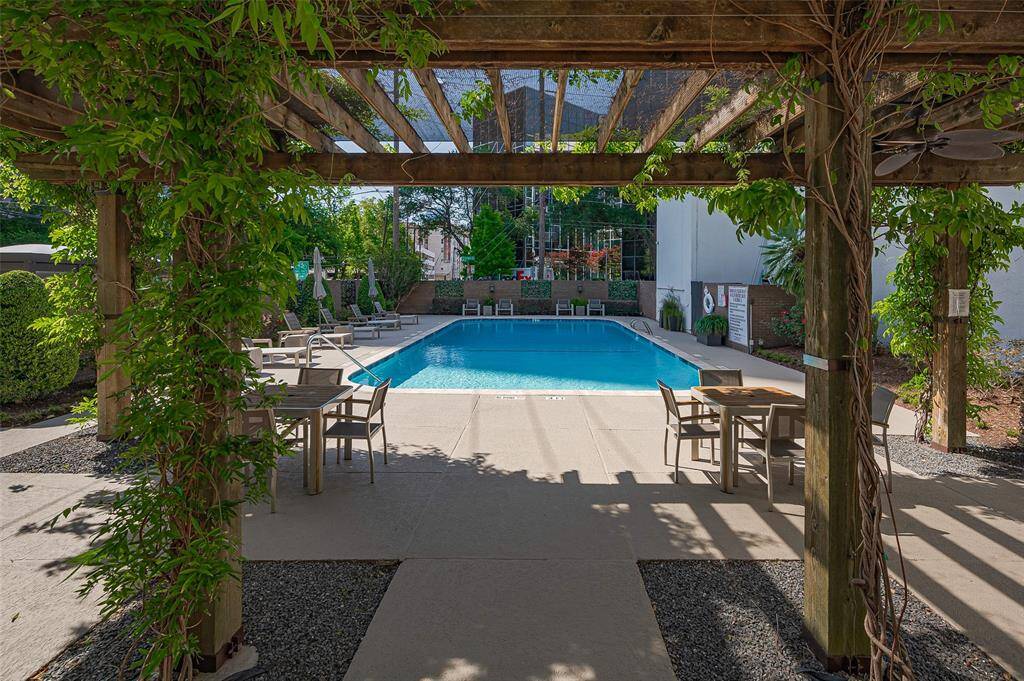 Resident pool and grilling area with a covered pergola