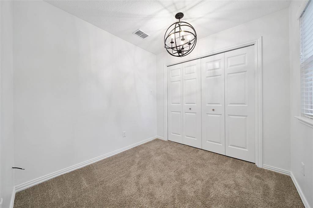 Extra Room off of Primary Bedroom. Can be made into custom closet.