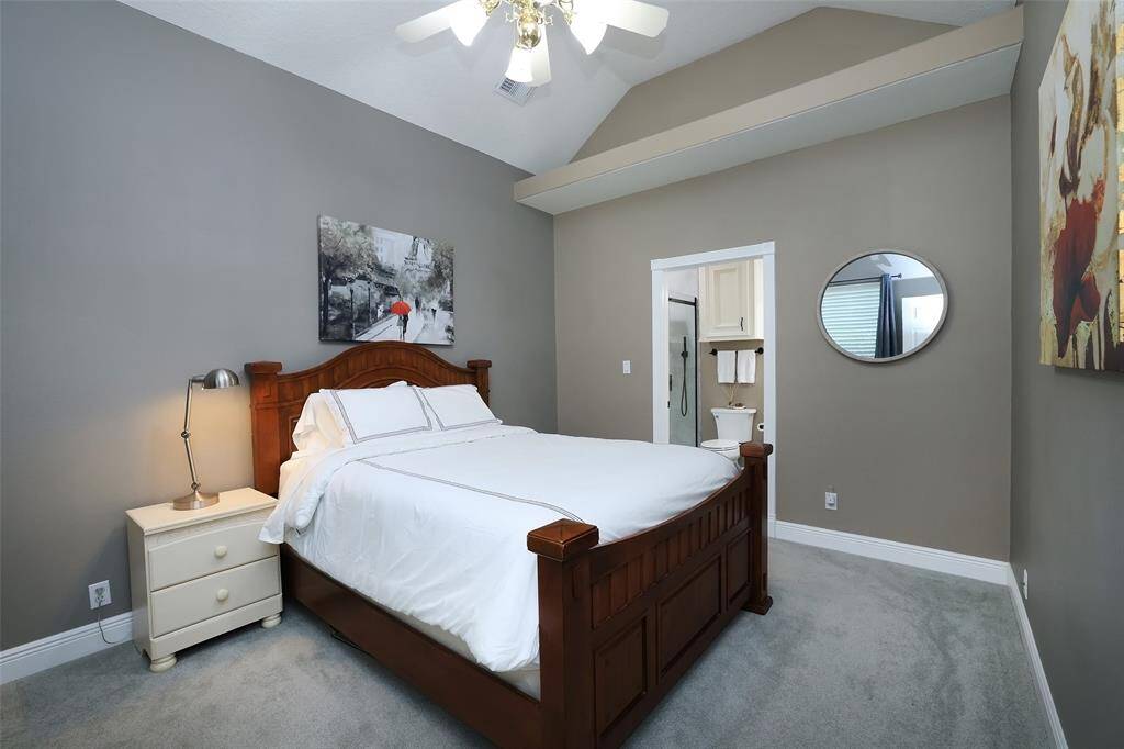 This is the 2nd bedroom down with private bath. Entry into the bath has been enlarged to 36 inches to accommodate equipment such as a wheelchair or walker.