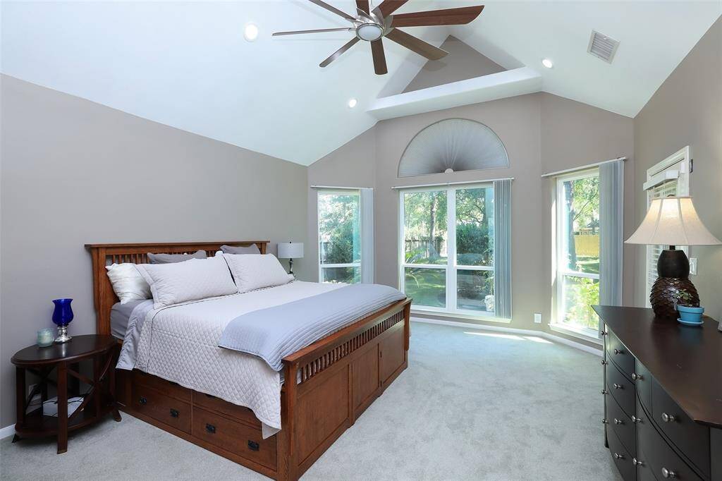Master bedroom is very spacious with new carpet and ceiling fan.