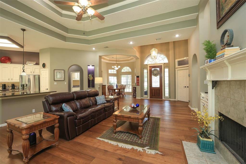 From the front door it is easy to see this spaciously designed home has an open and flowing floorplan, living and dining area carpet was removed and a warm English Oak wide plank flooring added.