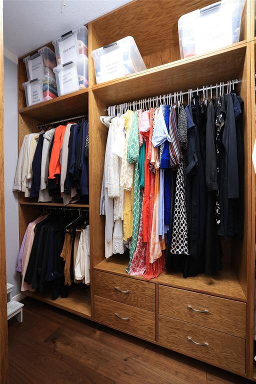 Another view of her side of custom closet, this is just one end, there is more not shown.