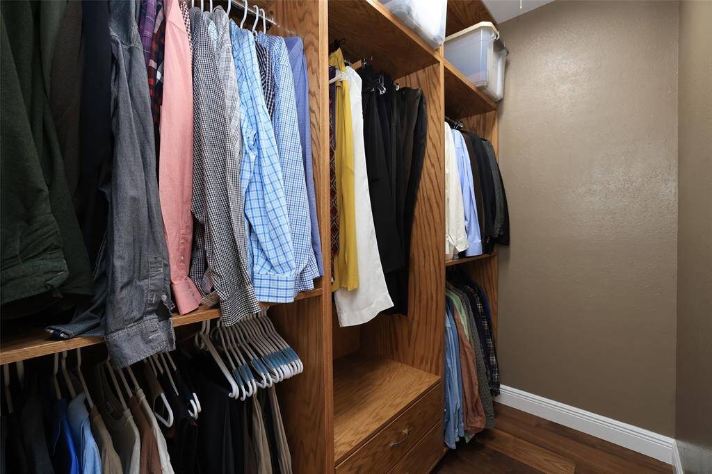 This is his closet, more drawers not pictured for him.