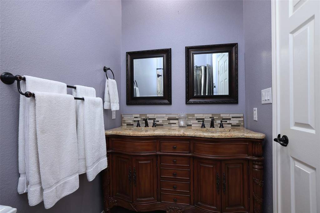 Another view of the furniture style vanity in the upstairs bath. So pretty.
