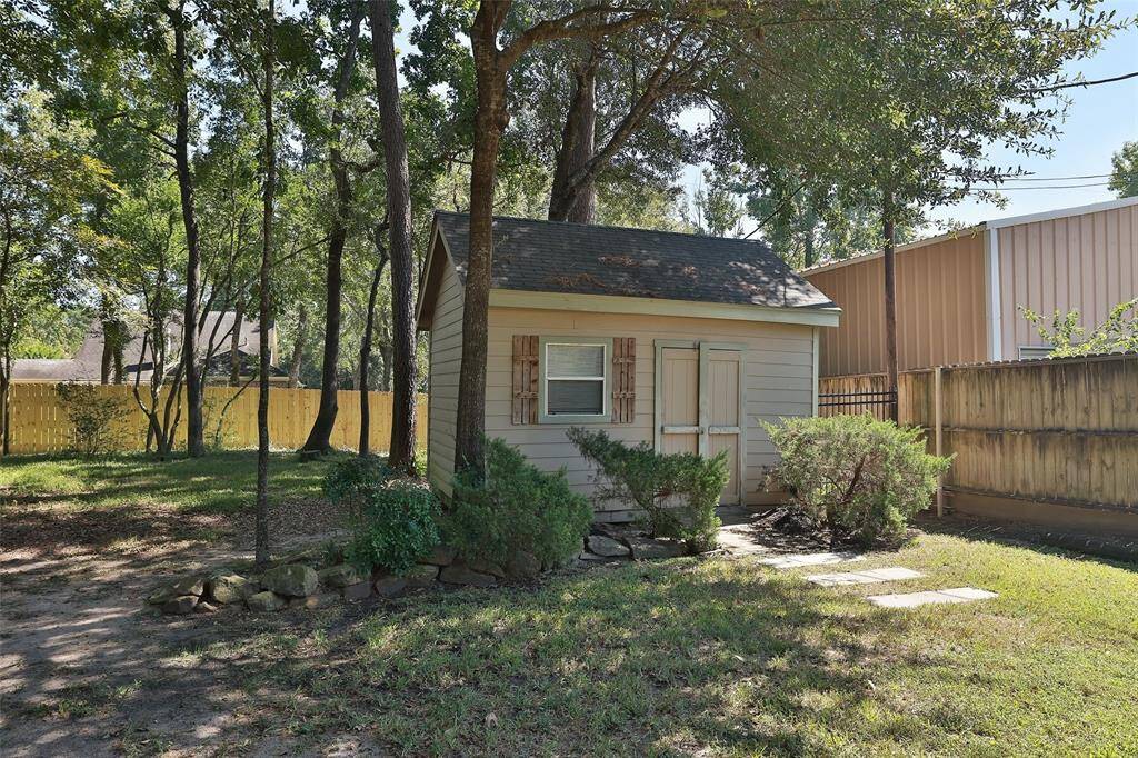 In the far corner of the backyard is this shed with loads of room for all your outdoor equipment.
