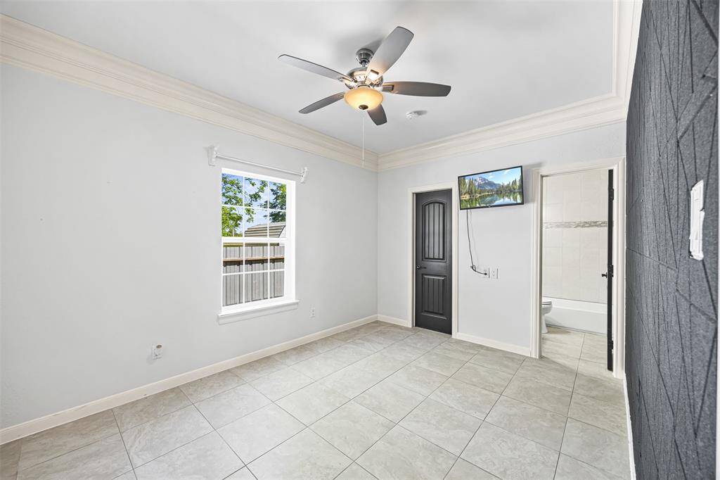 4th bedroom- All secondary bedrooms feature their own full bathrooms with tub/shower combos and beautiful custom cabinetry