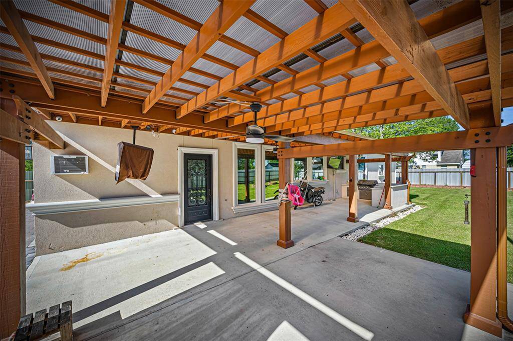 Featured Outdoor Kitchen and Covered deck/patio