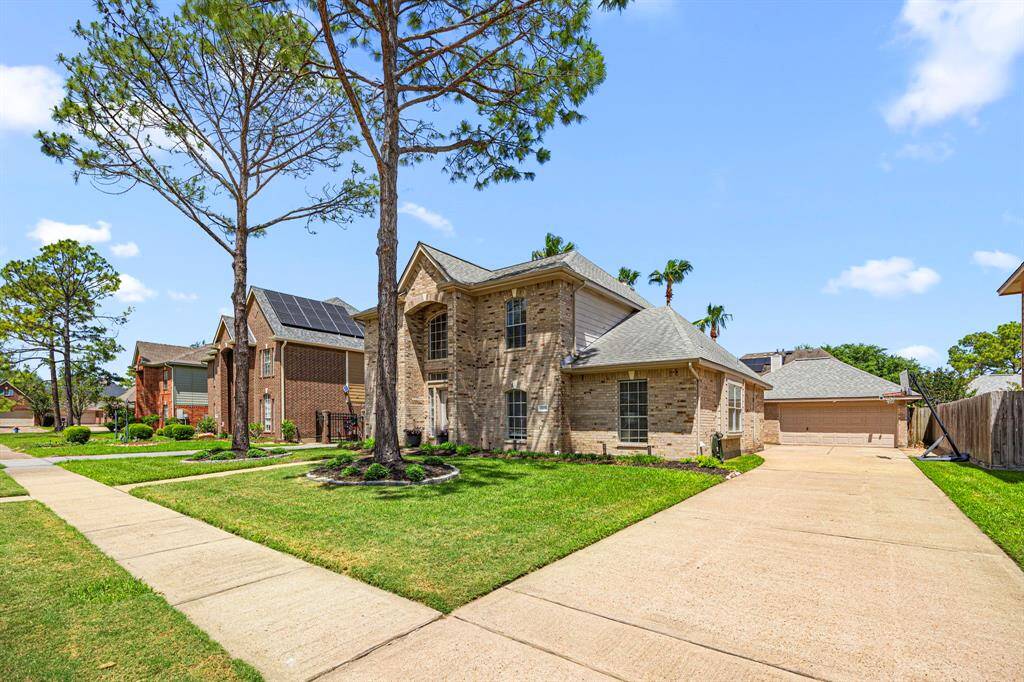 Large lot with detached garage.