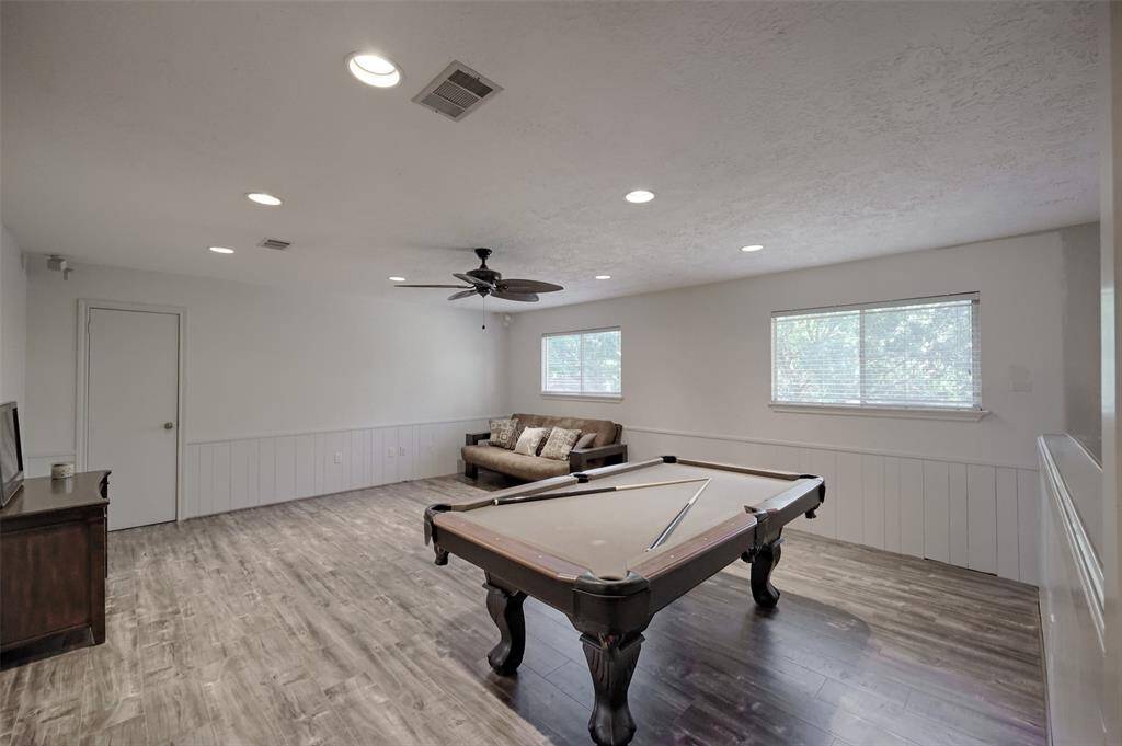 Large Upstairs Gameroom with plenty of space for a tv area and pool table.