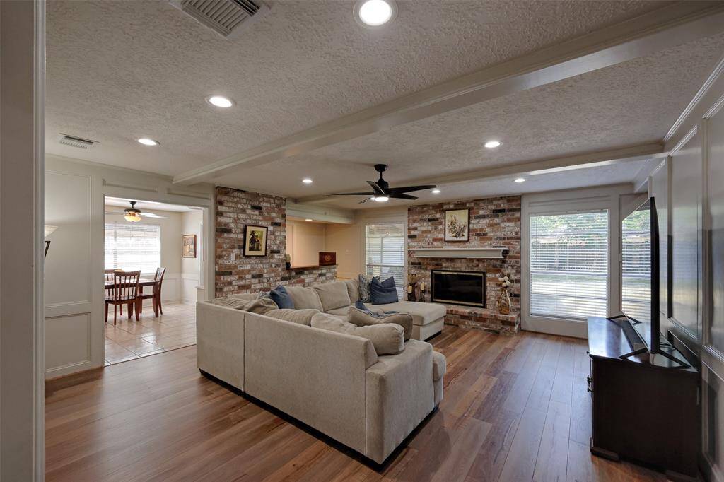 Living Room with plenty of natural sunlight from the large open windows.