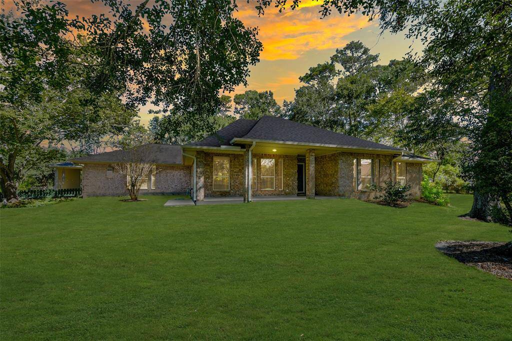 Welcome to 5401 Palm Drive! This beautifully kept single-story brick home on a gated and fenced nearly 2-acre property in Dickinson boasts tons of versatility with tons of storage or workspace & 4 bedrooms including a handicap accessible guest suite.