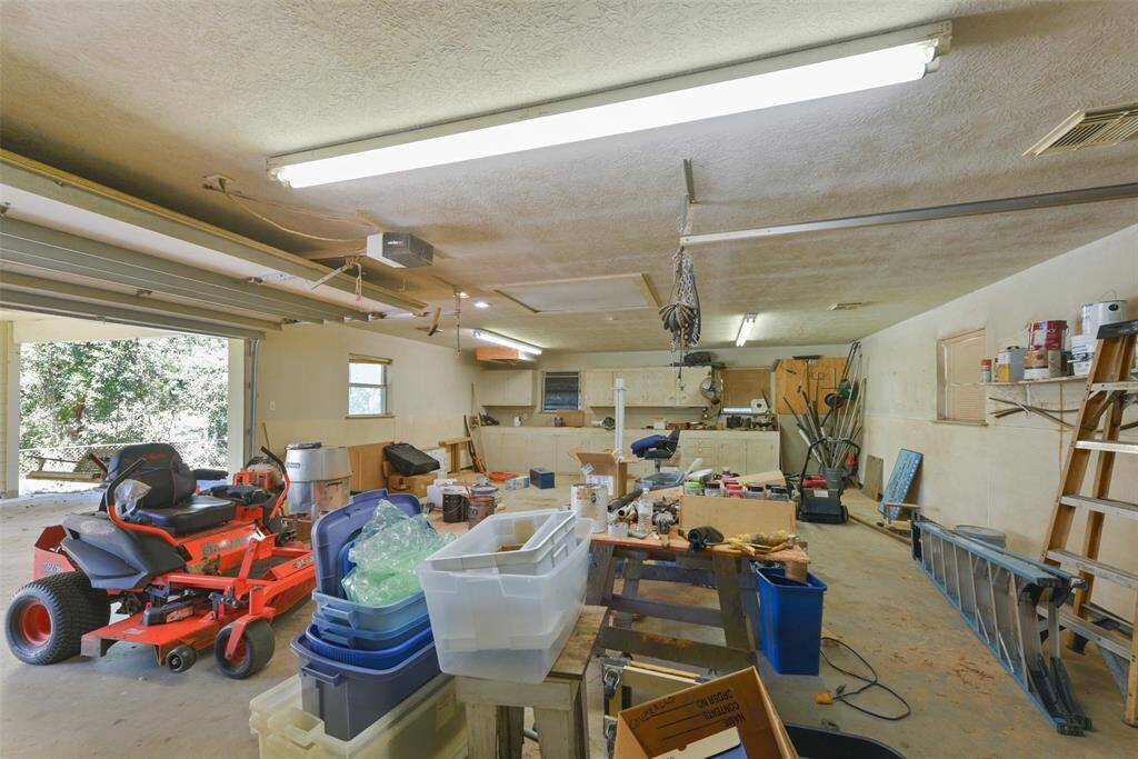 This is a glimpse inside of the workshop with more than enough space to tinker or get the job done! With no deed restrictions here, you are free to use this space in whatever way suits your needs!