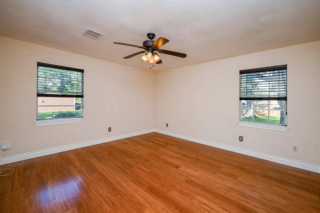 The spacious master bedroom is located on the first floor and overlooks the backyard.