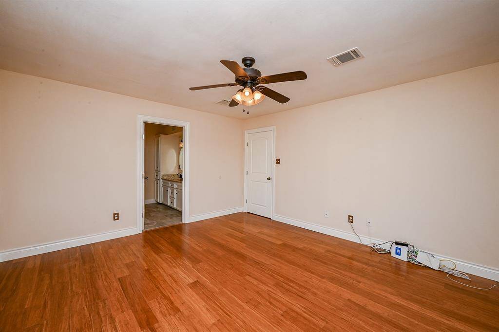 The private master bedroom is complete with an en suite bathroom.