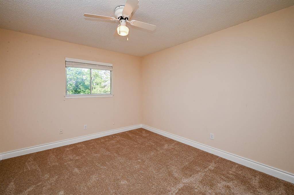 All secondary bedrooms are located on the second floor and are carpeted.  This is bedroom #1 of 3.