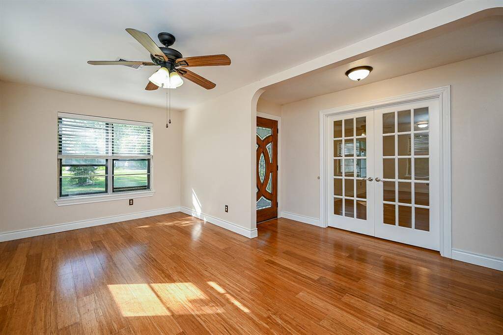 View from the front entry.  French doors lead to the large bonus room.