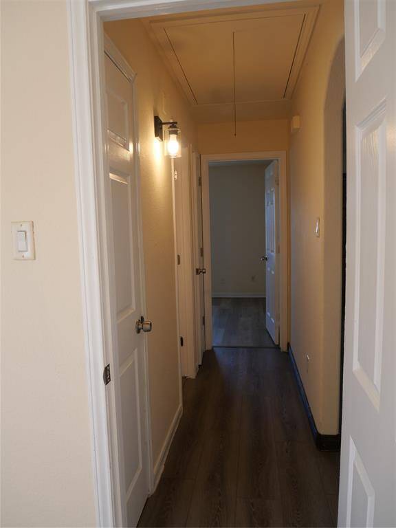 Hallway to 2 guest bedroom and guest bathroom