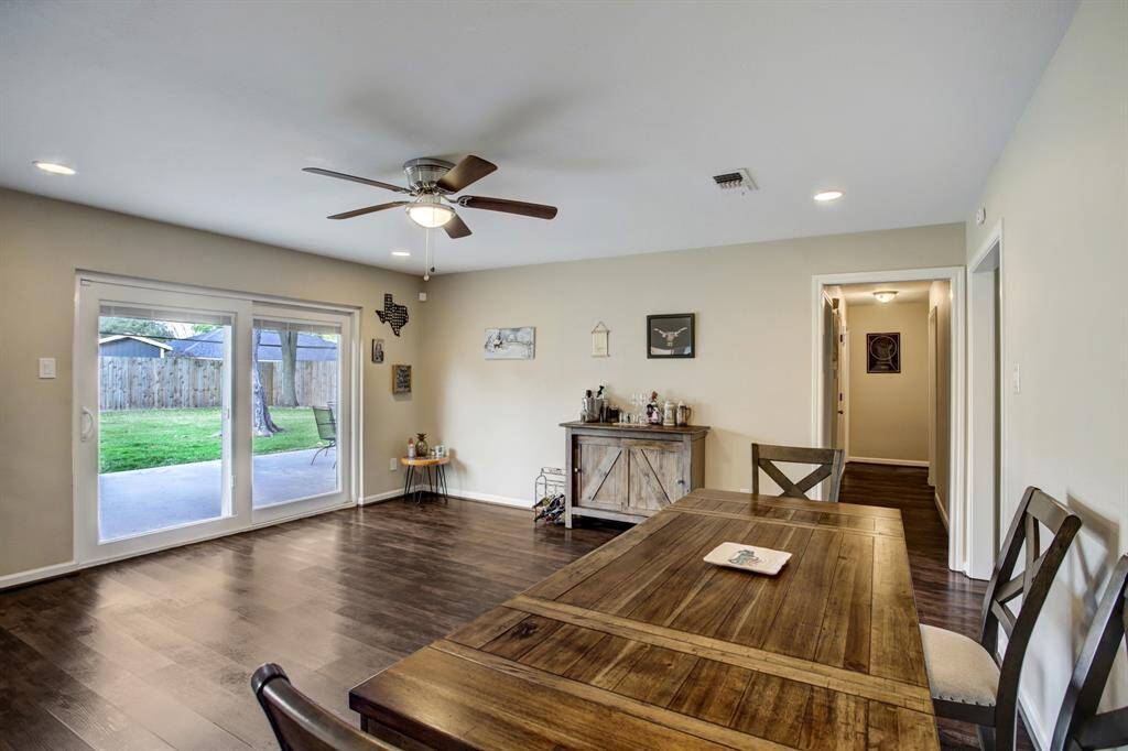 Another view of this spacious room. Looking down hallway to the bedroom wing.