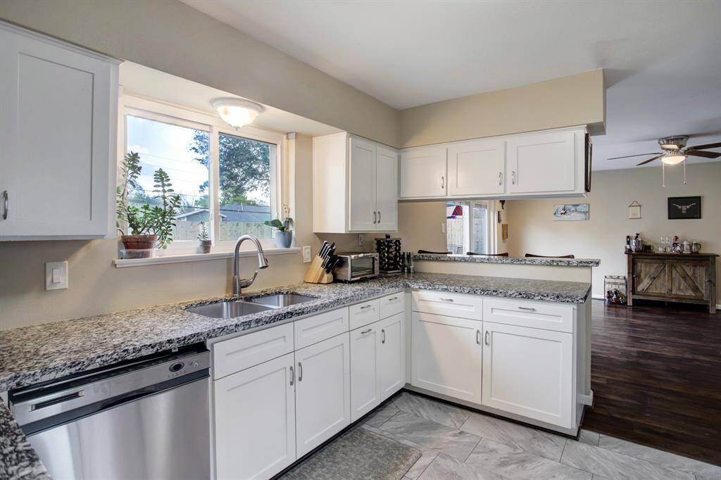 Fresh crisp white cabinets with brushed nickel hardware.