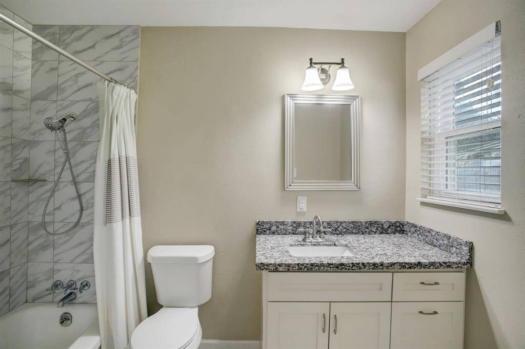 Totally remodeled primary bathroom. with granite countertops