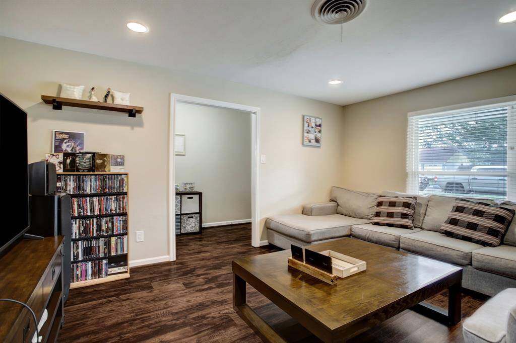 Another view of living area looking towards the entry foyer.