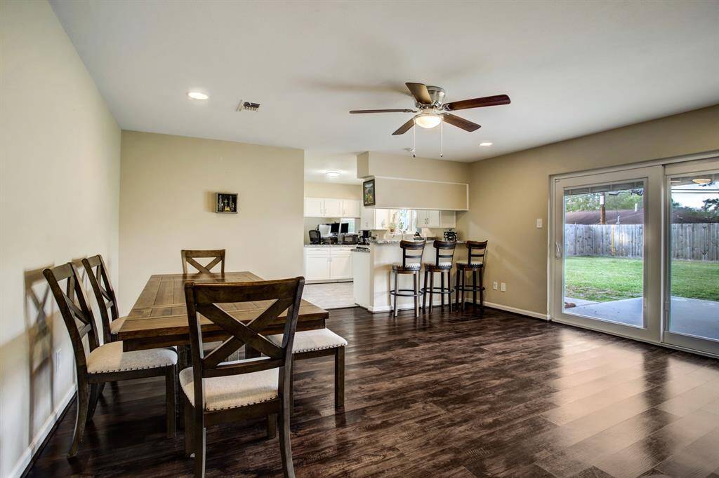 Dining area opens to the kitchen. Lots of natural light and recessed lights too.