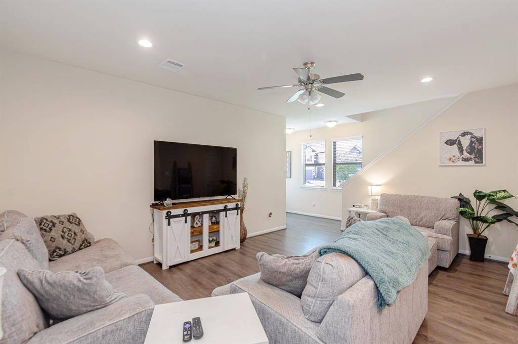 Spacious downstairs master suite with an expansive walk-in closet.