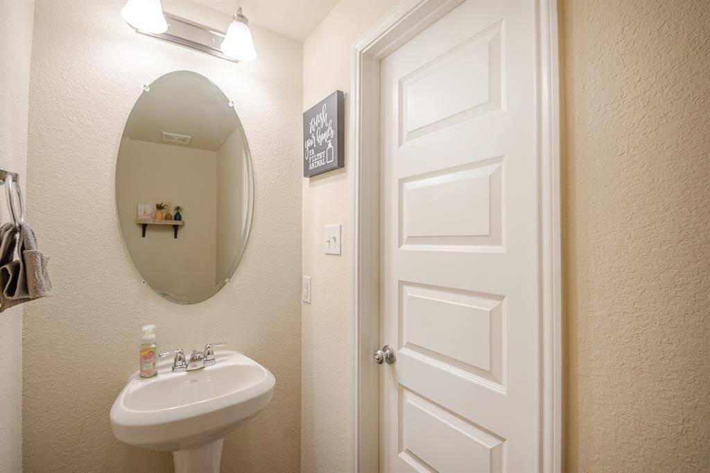 Spacious master bathroom vanity with ample countertop space.