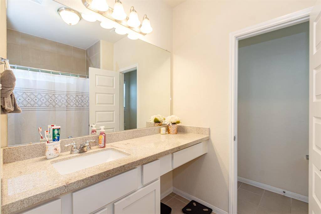 Convenient upstairs bathroom serving all bedrooms, featuring modern finishes.