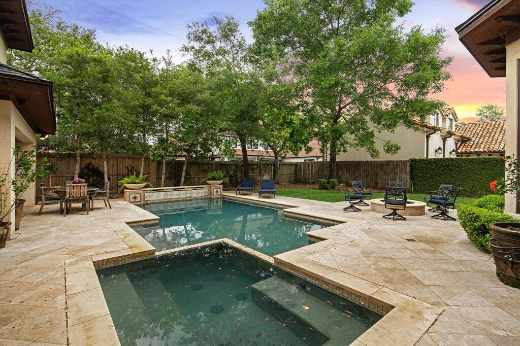 Another view of the picturesque backyard that’s perfect for indoor-outdoor dining and entertaining,