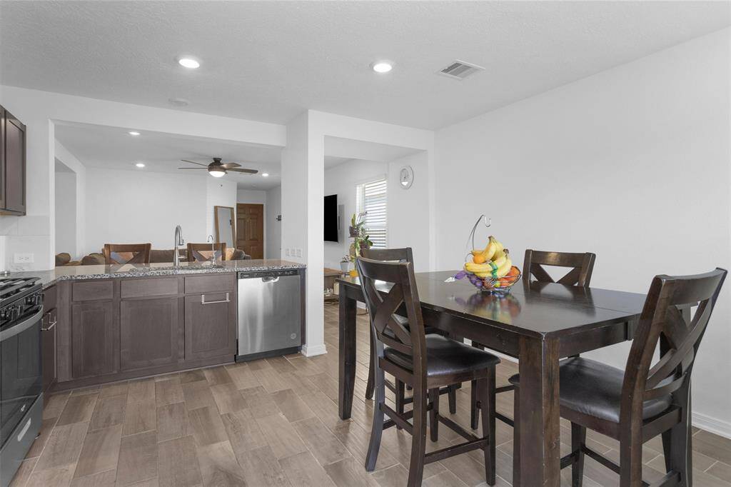 Entertaining made easy in this open-concept kitchen, dining and living area!