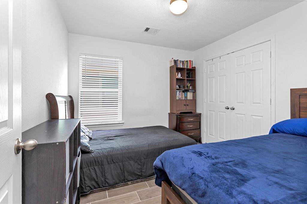 The secondary bedroom features lots of natural light and plenty of space!