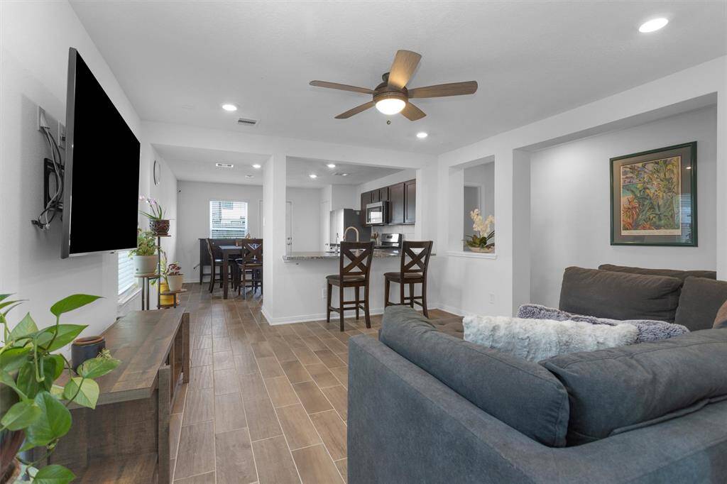 The open concept floorplan is perfect for everyday living or for entertaining guests!