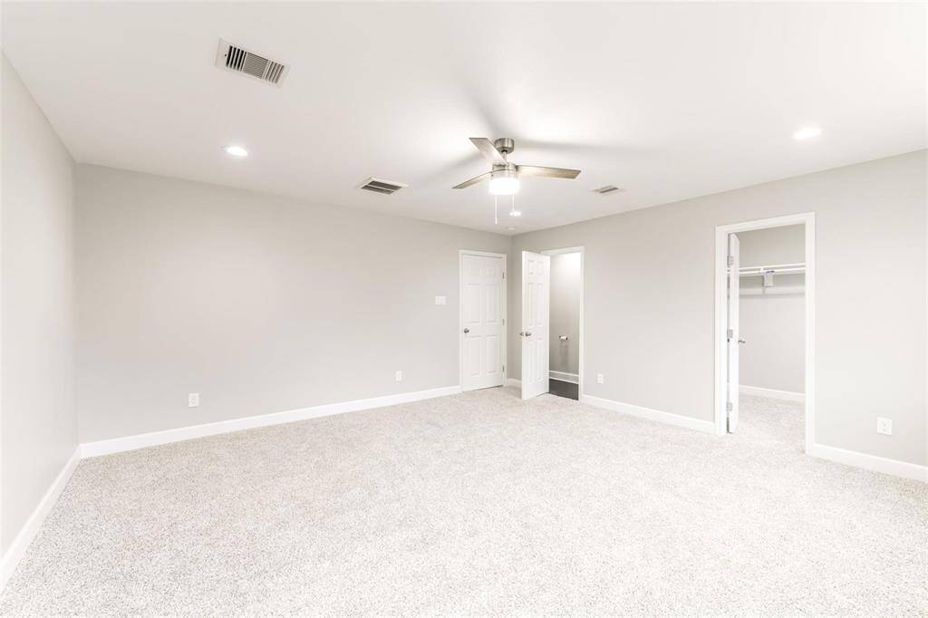 Primary bedroom offers a walk-in closet and ensuite bathroom for the ultimate privacy and relaxation