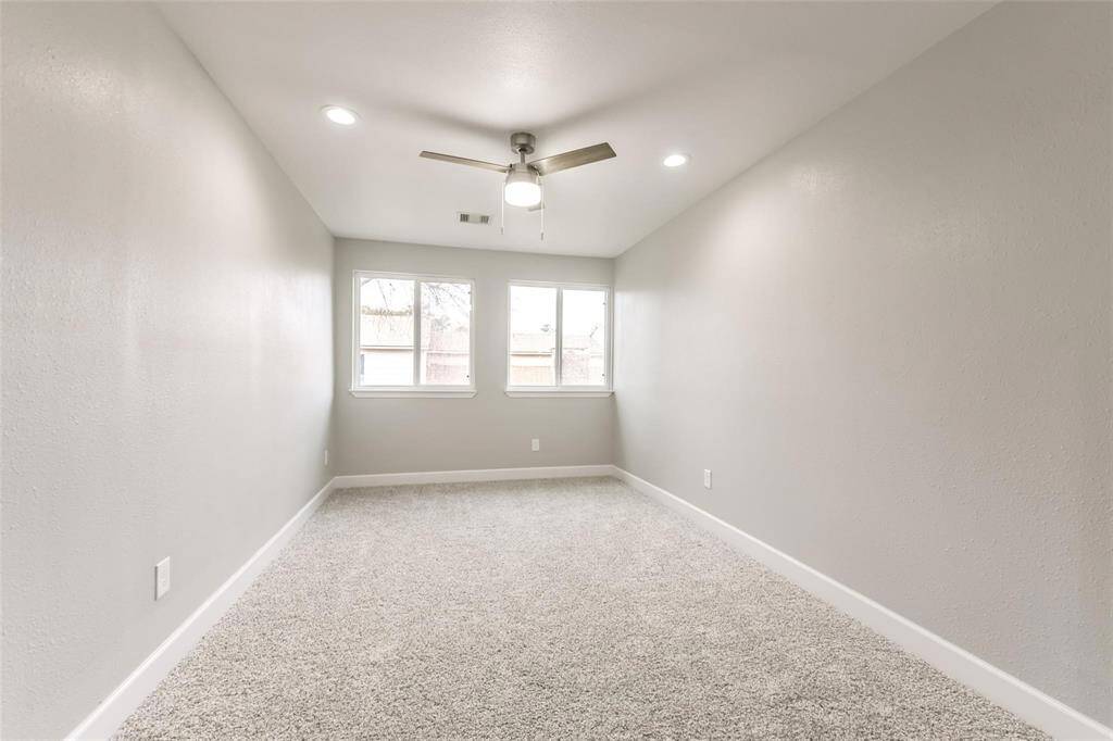 Bedroom two offers ample lighting and space