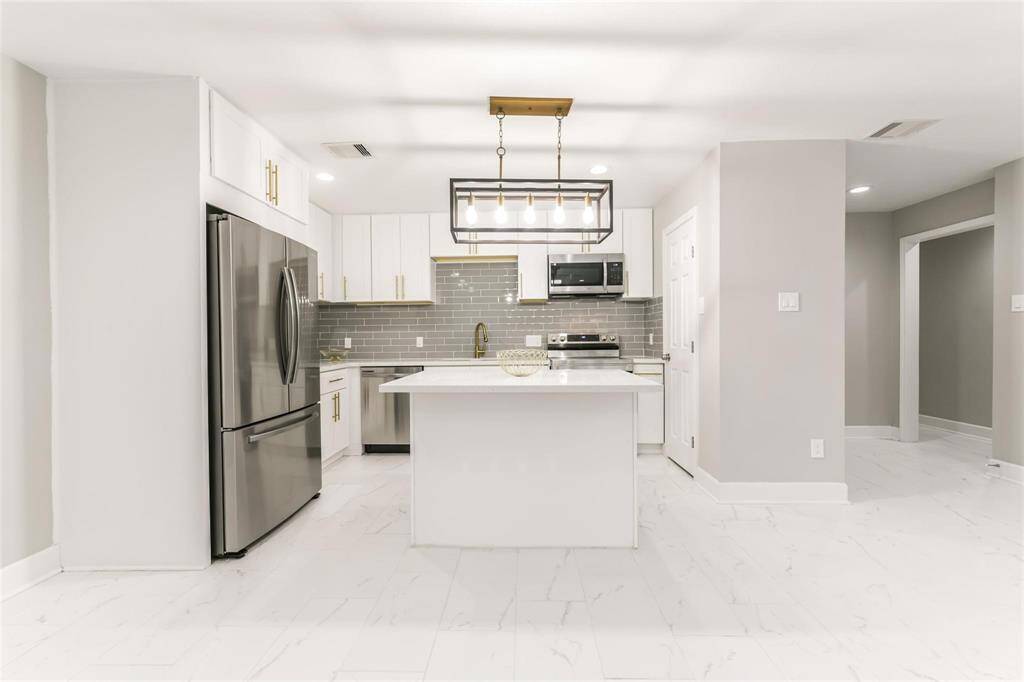 Kitchen also has easy access to garage