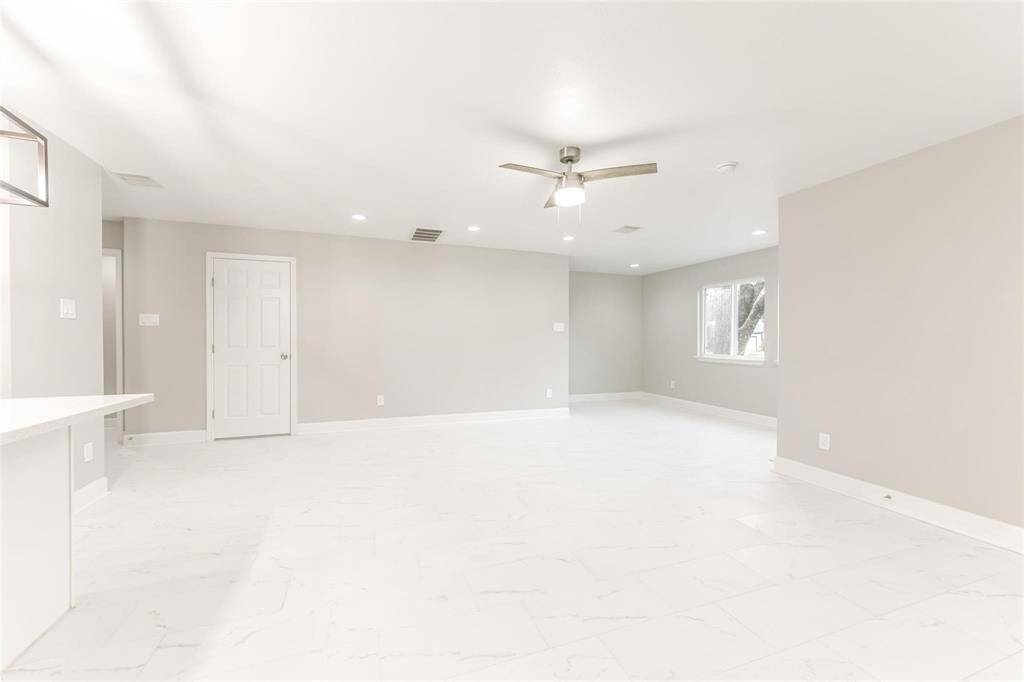 As you wind down for the night, windows offer a gorgeous view of the sunset that spreads natural light throughout the living space