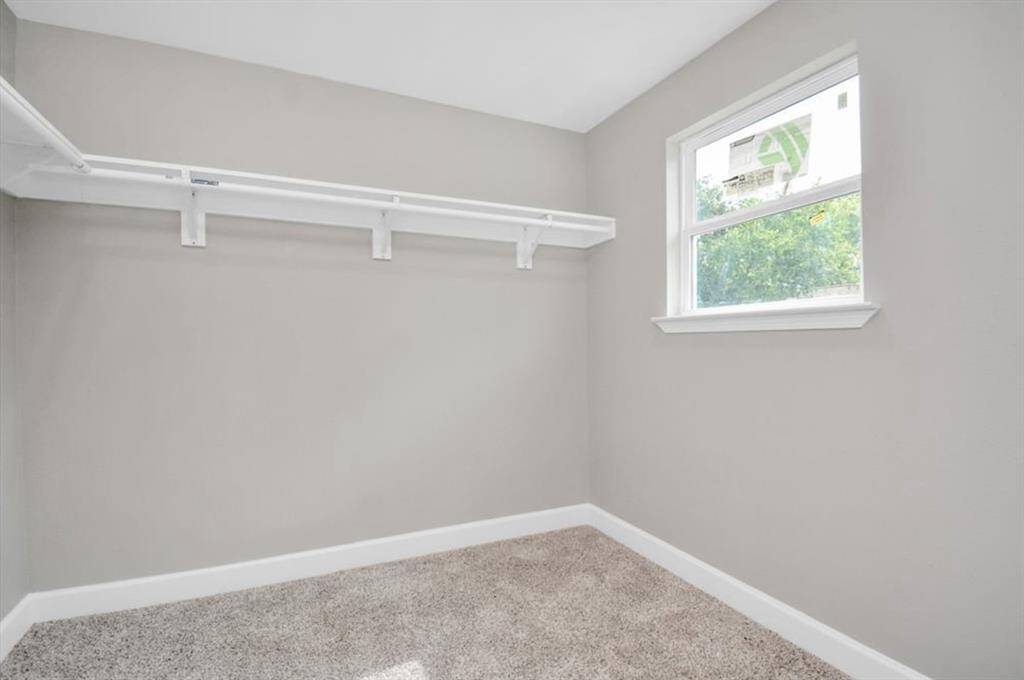 Primary Bedroom walk-in closet