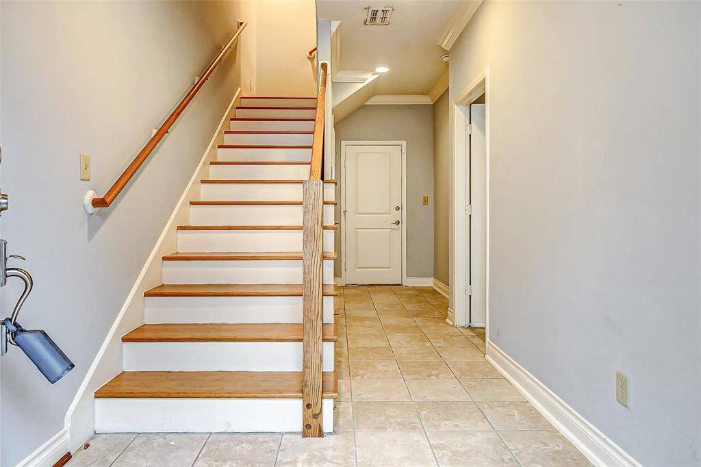 This home is 3levels- the first is home to aguest bedroom and full bath.This is also where you canaccess your laundry room with room for a full size washer and dryer. Youhave the option of gas or electricfor the dryer. Also accessible on this floor is the attached two car garage!