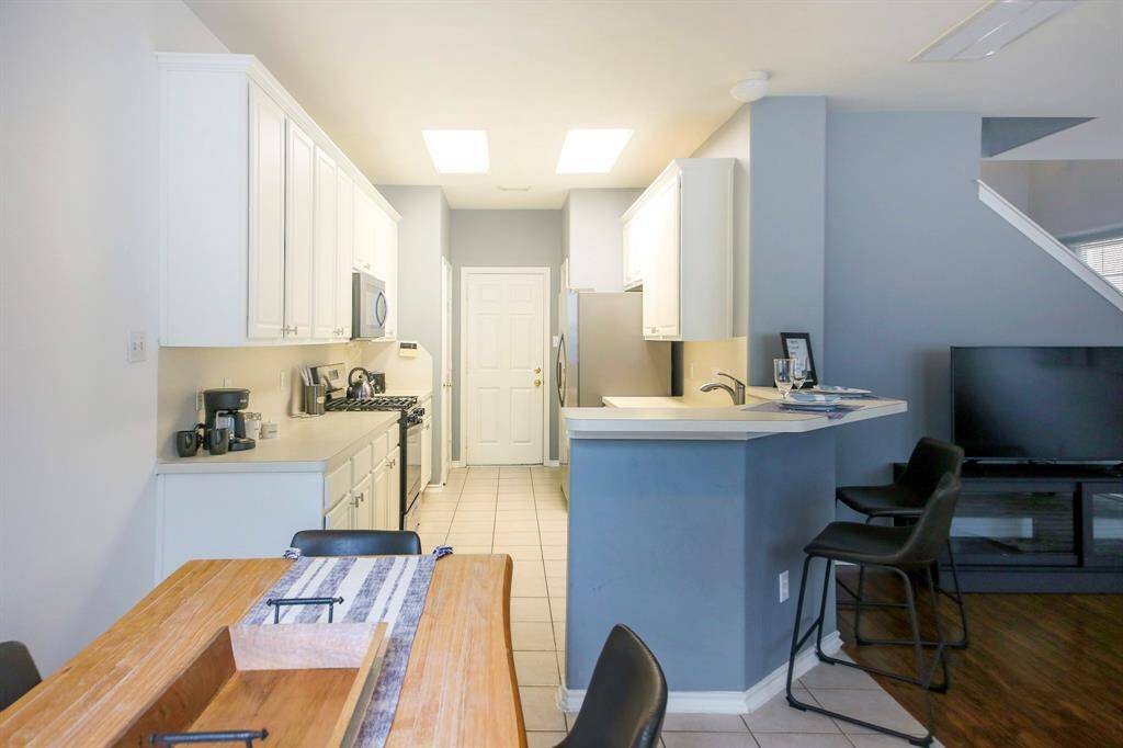 WHITE KITCHEN CABINETS - TWO PANTRIES