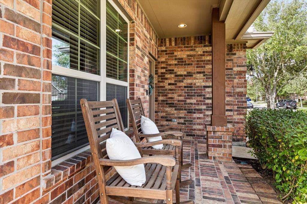 Cozy front porch! Rockers stay with the home!!