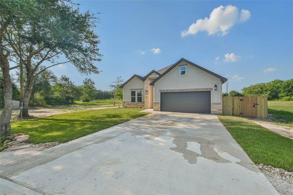 Plenty of extra parking and notice the mature trees on your 1/2 acre lot