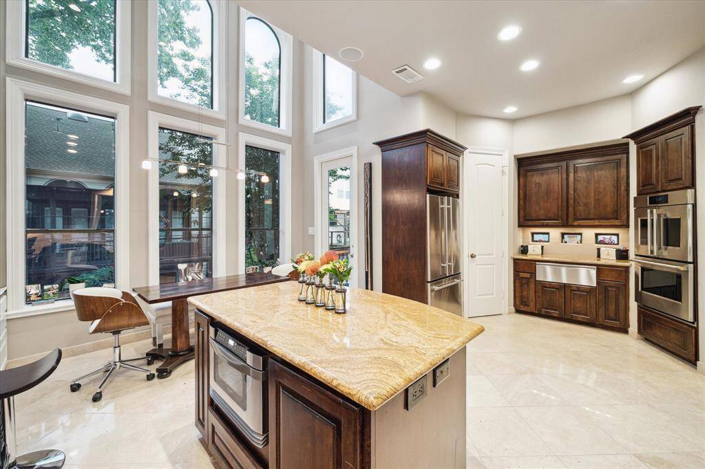 Equipped with top of the line appliances and thoughtful positioning making for ease of chefs cooking.