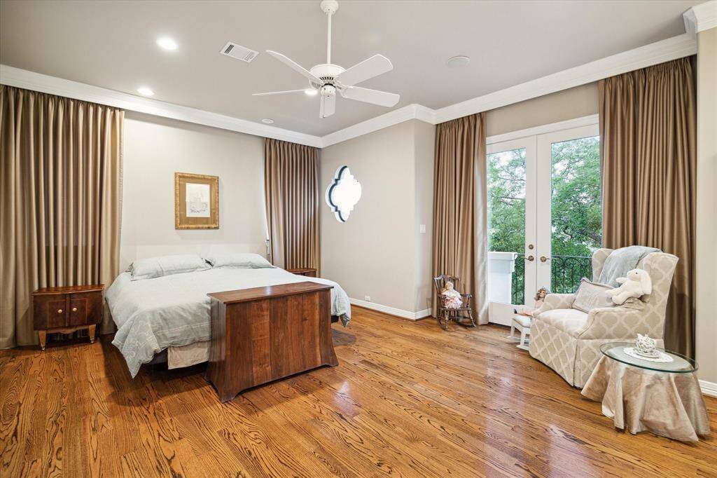 You'll find a primary suite with jaw dropping bath and boutique-like closet. Primary suite includes secondary fireplace and balcony brushing tree tops.