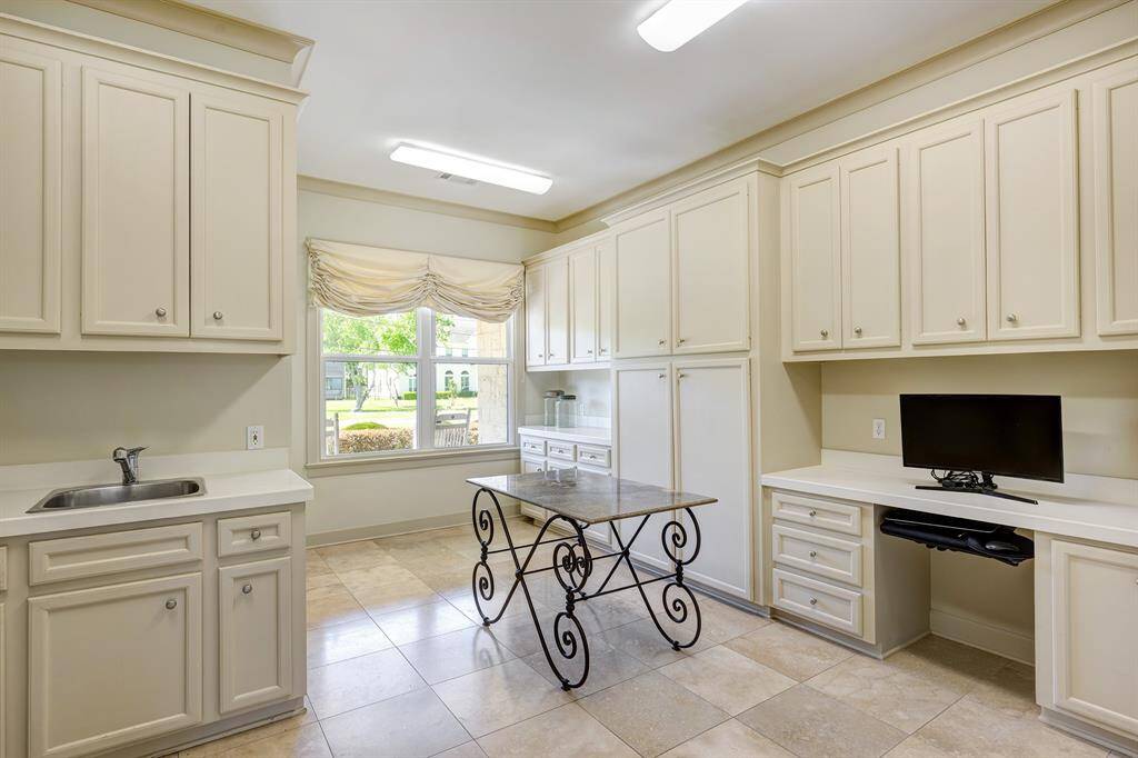 Oversized laundry room with so much storage