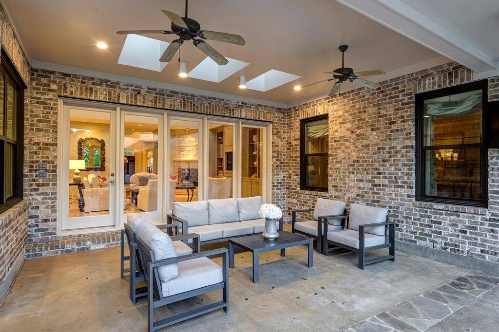 Large outdoor entertaining space accessible from family room and first-floor primary bedroom